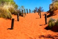Orange sandy path going uphill in Australian outback Royalty Free Stock Photo