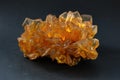 Orange Selenite Crystal Cluster, also known as satin spar, desert rose, or gypsum flower.