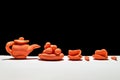 Orange set of plasticine on a black background