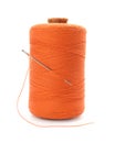 Orange sewing thread with needle on white background Royalty Free Stock Photo