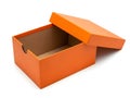 Orange shoe box with open lid on white background, empty interior Royalty Free Stock Photo