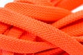 Orange shoelaces, isolated on a white background, close up Royalty Free Stock Photo