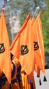 Orange sikh flags with khanda symbol during a religiuous process