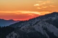 Orange sky during a sunset over mountains. Olympic National Park, Washington Royalty Free Stock Photo