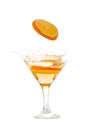 Orange slice falling into the cocktail