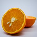 Orange. Slice of fresh orange isolated on white background. Royalty Free Stock Photo