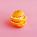 Orange slice on pastel color background.Summer and healthy concept