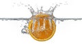 Orange slice splashing into water creating a crown like splash effect Royalty Free Stock Photo