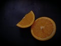 Orange slices on black Royalty Free Stock Photo