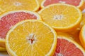 Orange slices of both standard and pink Cara Cara oranges Royalty Free Stock Photo