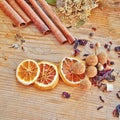 Orange slices, cinnamon rolls and other spices and grains