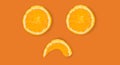 Orange slices isolated on orange color background. smile symb Royalty Free Stock Photo