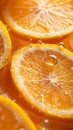 Orange slices with sparkling water droplets, macro Royalty Free Stock Photo