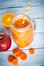 Orange smoothie from carrot and apple. Royalty Free Stock Photo