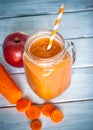 Orange smoothie from carrot and apple. Royalty Free Stock Photo