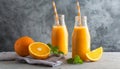 Orange smoothie in glass bottle with paper straw. Tasty and healthy drink. Summer beverage Royalty Free Stock Photo