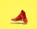 Orange sneakers sport footwear shopping yellow background