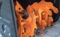 Orange snow removing machine screw