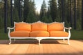 Orange sofa on the wooden floor. Forest in the background.