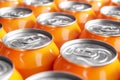 Orange soft drink cans. Macro shot
