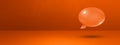 Orange speech bubble on concrete wall banner background Royalty Free Stock Photo