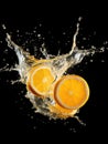 orange with splash on black background,orange Juice photo retouching