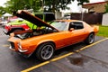 Orange Split Bumber Chevrolet Camaro at Car Show