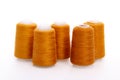 Orange spool of thread isolated on white background. Skein of woolen threads. Yarn for knitting. Materials for sewing Royalty Free Stock Photo