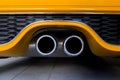 Orange sports car exhaust pipe Royalty Free Stock Photo