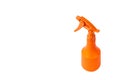 Orange spray bottle isolated on a white background Royalty Free Stock Photo