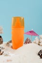 orange spray bottle of sunblock near Royalty Free Stock Photo