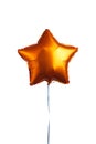Orange star balloon, isolated on white Royalty Free Stock Photo