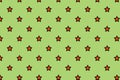 Orange stars on green background.