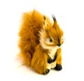 Orange statuette of a squirrel isolated on a white background