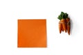 Orange sticky note and carrots bunch isolated