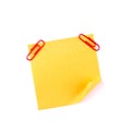 Orange sticky paper note with red clips Royalty Free Stock Photo