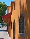 Orange stucco storefront in and sidewalk in Bemidji Minnesota