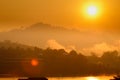 Orange Sun up to Sunrise over mountain and reflect on river morning Royalty Free Stock Photo