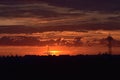 Orange sunrise cloudy sky over the park Royalty Free Stock Photo