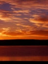 Orange Sunrise on a lake in Colorado