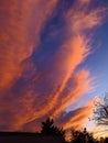 Orange Sunset Clouds That Look Like Fire In The Blue Sky