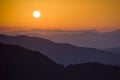 Orange sunset over the hills