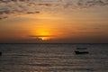 Orange sunset over the Indian Ocean on the coast of Pemba Island, Tanzania Royalty Free Stock Photo