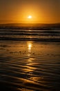Orange sunset over Enniscrone Beach, Ireland. Royalty Free Stock Photo