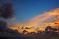 Orange sunset over sea, with dark clouds Royalty Free Stock Photo