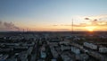 Orange sunset over small town. Top view from drone Royalty Free Stock Photo