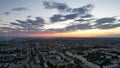 Orange sunset over small town. Top view from drone Royalty Free Stock Photo