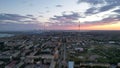 Orange sunset over small town. Top view from drone Royalty Free Stock Photo