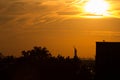 Orange sunset over the Statue of Liberty Royalty Free Stock Photo