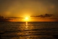 Orange Sunset over Tropical Island Ocean Calm Water Royalty Free Stock Photo